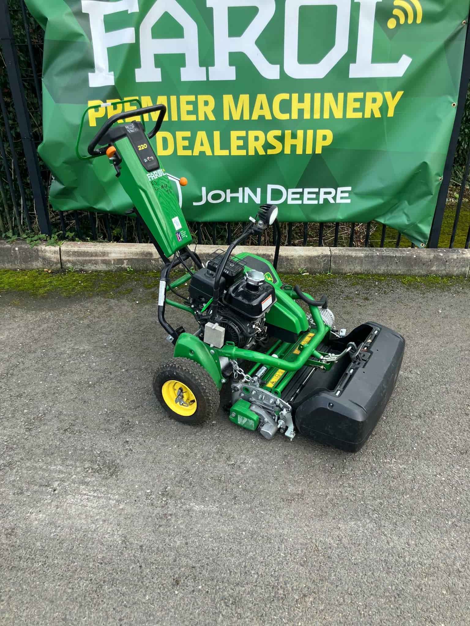 John Deere 220E walk behind hybrid greens mower